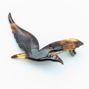 Vintage faux tortoise shell flying bird brooch pin